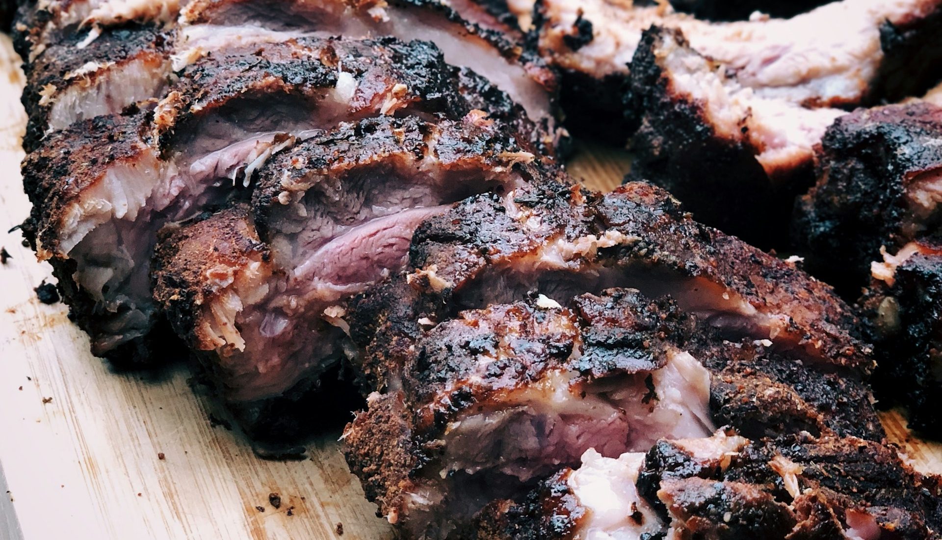 Sliced barbecue steak with a deeply browned crust